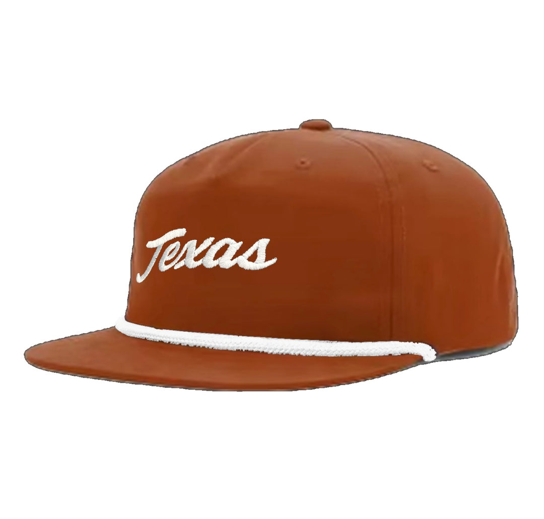 Burnt orange rope hat with white rope and white Texas script embroidered on hat 